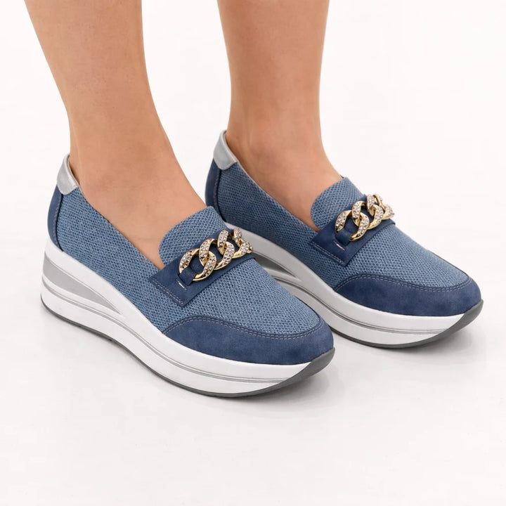 Zapatillas Calliope color azul, vista lateral del par